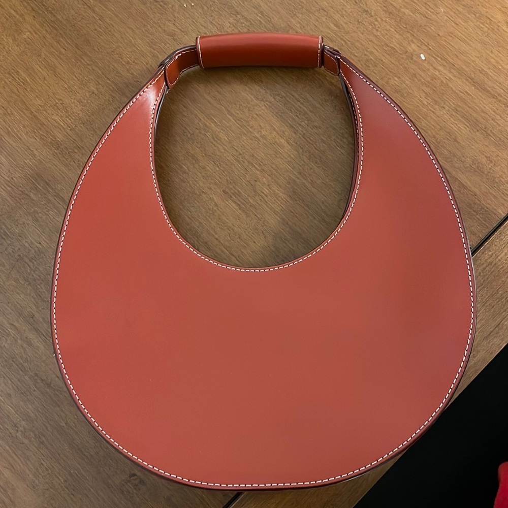 Staud moon bag in burnt orange